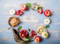 Rosh hashanah  Hashana - jewish New Year holiday concept. Traditional symbols: Honey jar and fresh apples with pomegranate and Royalty Free Stock Photo