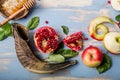 Rosh hashanah  Hashana - jewish New Year holiday concept. Traditional symbols: Honey jar and fresh apples with pomegranate and Royalty Free Stock Photo