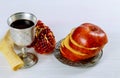 rosh hashanah jewesh holiday concept - shofar, torah book, honey, apple and pomegranate over wooden table. a kippah a yamolka Royalty Free Stock Photo