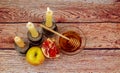 rosh hashanah jewesh holiday torah book, honey, apple and pomegranate over wooden table. traditional symbols. Royalty Free Stock Photo
