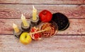 rosh hashanah jewesh holiday torah book, honey, apple and pomegranate over wooden table. traditional symbols. Royalty Free Stock Photo