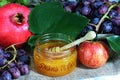 Rosh Hashanah Jewish New Year, composition for the Jewish holiday. Honey, Apple and Pomegranate - main fruits on Jewish holiday