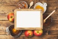 Rosh hashanah jewish new year holiday celebration concept. Honey and apples over wooden background. Top view Royalty Free Stock Photo