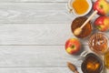 Rosh hashanah jewish new year holiday celebration concept. Honey and apples over wooden background. Top view Royalty Free Stock Photo