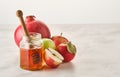 Rosh hashanah jewish New Year holiday concept. Apples, honey, pomegranate Royalty Free Stock Photo