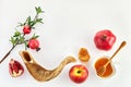 Rosh hashanah, jewish New Year holiday concept. Pomegranate, apples and honey traditional products for celebration Royalty Free Stock Photo