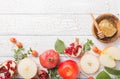 Rosh hashanah - jewish New Year holiday concept. Traditional symbols: Honey jar and fresh apples with pomegranate and shofar -horn Royalty Free Stock Photo