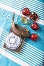 Rosh hashanah - jewish New Year holiday concept. Traditional symbols: Honey jar and fresh apples with pomegranate and shofar -horn Royalty Free Stock Photo