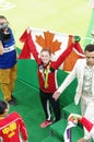 Rosie MacLennan with Canadian national flag