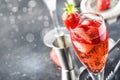 Rossini alcoholic cocktail with Italian sparkling wine, strawberry puree and ice in champagne glasses, place for text, selective Royalty Free Stock Photo