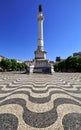 Rossio square in the central Lisbon with a monument of the king Pedro IV.