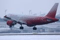 Rossiya - Russian Airlines Airbus landing on snowy airport