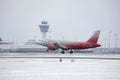 Rossiya - Russian Airlines Airbus A319-100 VP-BIS landing on snowy airport Royalty Free Stock Photo