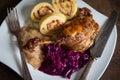 Rosted duck leg with cabbage and dumplings Royalty Free Stock Photo