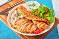 Rosti with grilled chicken, mushrooms and salad