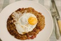 Rosti potatoes with fried egg Royalty Free Stock Photo