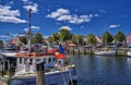 Rostock, Germany - Colorful Fishing boats resting in the peaceful canal on this spring hot day in WarnemÃÂ¼nde, Mecklenburg Royalty Free Stock Photo