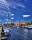 Rostock, Germany Sailing boats resting in the peaceful Alter Strom Canal on this spring hot day in WarnemÃÂ¼nde, Rostock, Royalty Free Stock Photo