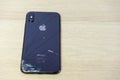 ROSTOV-ON-DON, RUSSIA - DECEMBER 20, 2018: iPhone Ten X with broken display. Modern smartphone with damaged glass screen. Device