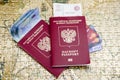 Rostov on Don, Russia, Travel concept, Russian passports, money, credit cards on a map, editorial