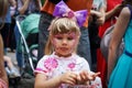 ROSTOV-ON-DON, RUSSIA - 20 May, 2018. Festival Ball of Babies. A beautiful little girl and in a festive dress and carnival mask