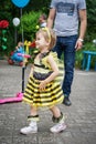 ROSTOV-ON-DON, RUSSIA - 20 May, 2018. Festival Ball of Babies. A beautiful little girl and in a festive dress and carnival mask