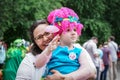 ROSTOV-ON-DON, RUSSIA - 20 May, 2018. Festival Ball of Babies. A beautiful little girl and in a festive dress and carnival mask