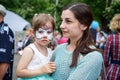 ROSTOV-ON-DON, RUSSIA - 20 May, 2018. Festival Ball of Babies. A beautiful little girl and in a festive dress and carnival mask