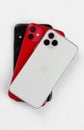 Apple iPhone 11 Red, Apple iPhone 11 Pro silver and Apple iPhone XR black