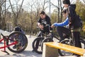 Rostov-on-don, Russian Federation, March 25, 2019. A company of young teenage boys sitting on their bikes and waiting for their