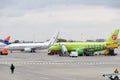 Rostov, Russia, 10-15-2017: Aircraft are serviced at the parking lot at airport. Royalty Free Stock Photo