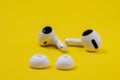 Rostov, Russia - July 06, 2020: Wireless headphones Apple AirPods Pro with removed soft, flexible silicone tapered tips laying