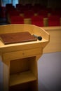 Rostrum with a microphone in a reference room