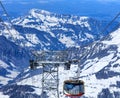 Rotair cable car gondola heading downwards from Mt. Titlis in Sw