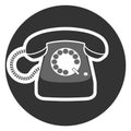 Rotary dial operated telephone icon or symbol