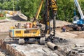 Rotary drilling rig BAUER BG 25 on North-Eastern Khorda construction near the Botanichesky Sad metro station. Installing