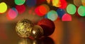 Rotating bokeh background of colorful Christmas decoration ornament.