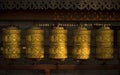 Rotating buddhist prayer wheels as symbol of buddhism religion Royalty Free Stock Photo