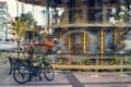 Rotating carousel and bicycle Royalty Free Stock Photo
