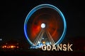 rotating ferris wheel at night in city of gdansk poland