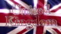Rotating glass United Kingdom caption against waving British flag. 3D rendering