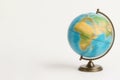 A rotating globe with blurred outlines on a light background. Space for text. Royalty Free Stock Photo