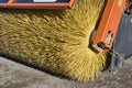 Rotating industrial brush of a street cleaning tractor