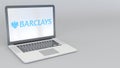 Rotating opening and closing laptop with Barclays logo. Computer technology conceptual editorial 4K clip