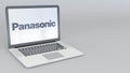 Rotating opening and closing laptop with Panasonic Corporation logo. Computer technology conceptual editorial 4K clip