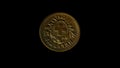 Rotating reverse of Switzerland coin 1 rappen 1941 with Latin name of Switzerland. Isolated in black background.