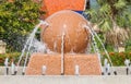 Rotating stone sphere water fountains.