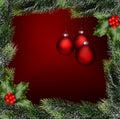 Rote Weihnachtskugeln mit WeihnachtsgrÃÂ¼n auf Rotem Hintergrund