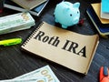 Roth IRA retirement plan and piggy bank Royalty Free Stock Photo