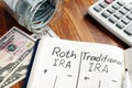 Roth IRA vs Traditional IRA written in notepad